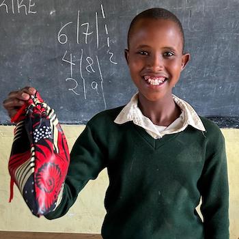SAG Kit Distribution image showing Nyorit Primary School girls receiving 85 kits in Nyorit, Tanzania on July 17, 2026