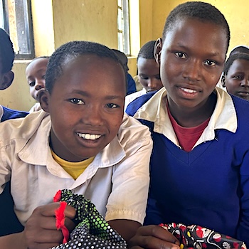 SAG Kit Distribution image showing Kimelok-Kimotoro Primary School girls receiving 84 kits in Kimelok, Tanzania on Aug 10, 2026